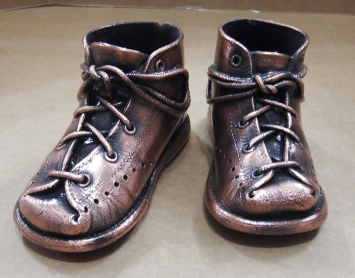 antique bronze baby shoes